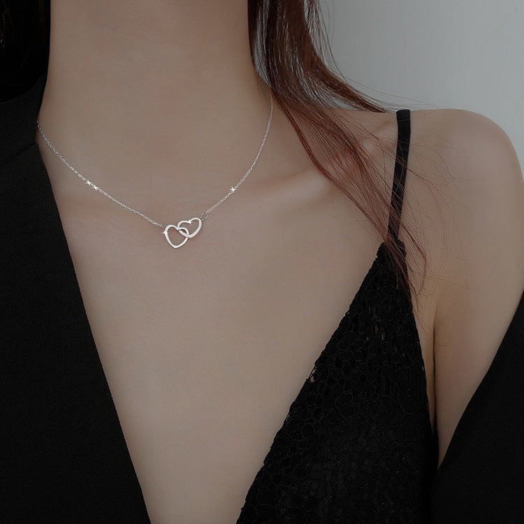 Collar con anillo de doble corazón